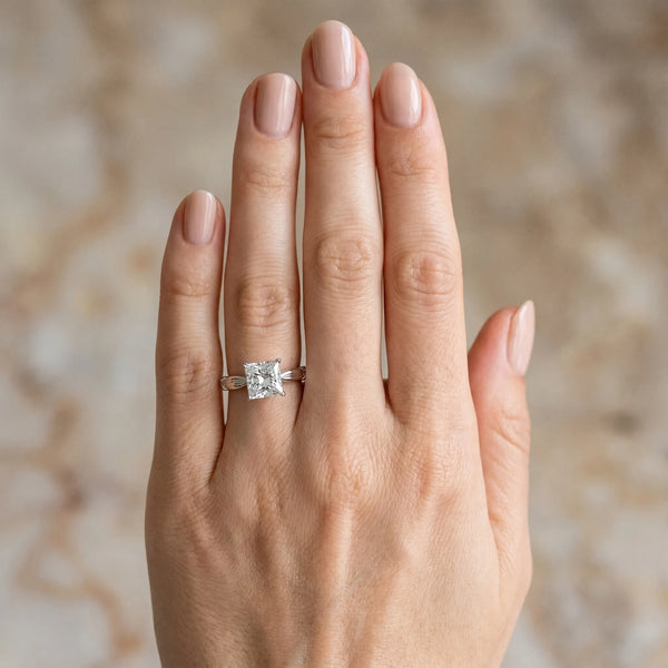 White gold Princess Solitaire Diamond Twisted Band with Four-Prong Setting