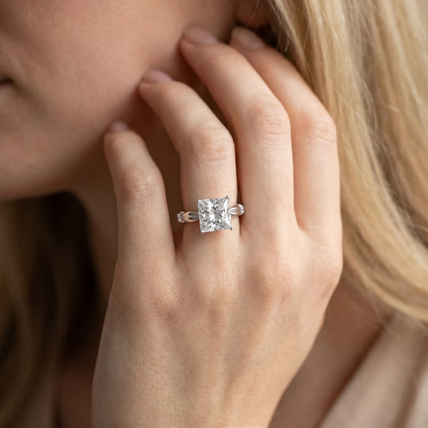 White gold Princess Solitaire Diamond Twisted Band with Four-Prong Setting