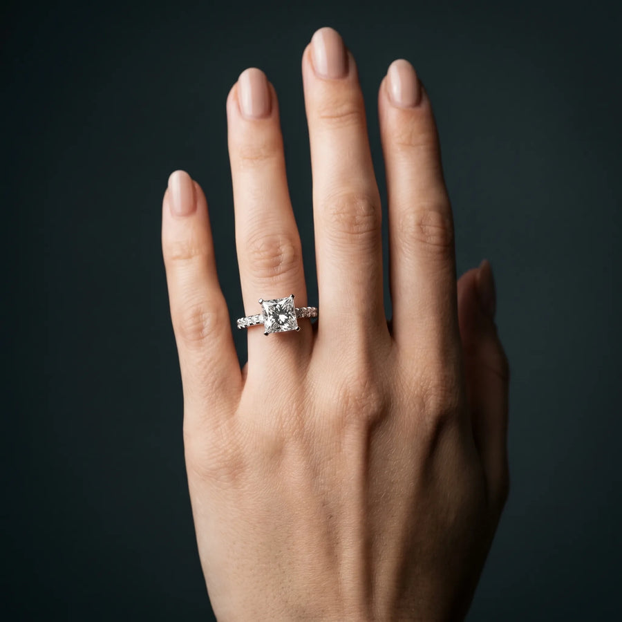 White gold Princess Solitaire Diamond with Pavé Band and Four-Prong Setting