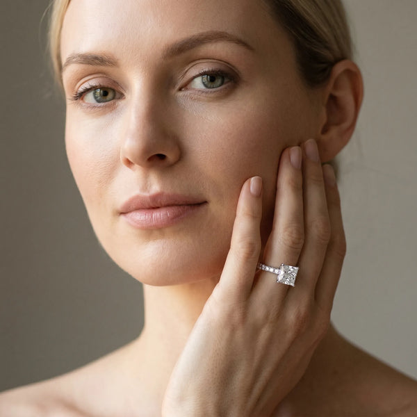 White gold Princess Cut Solitaire Diamond with Pavé Band and Four-Prong Setting