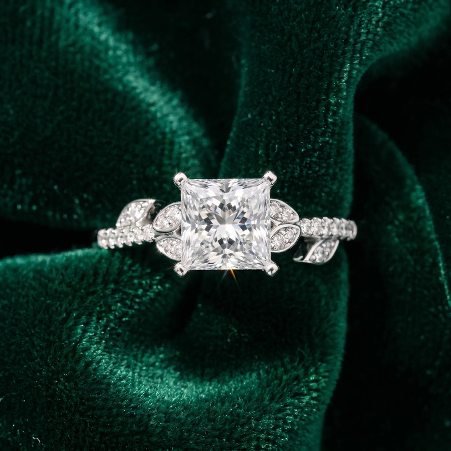 White gold Princess Solitaire Leaf-Inspired Diamond Ring with Pavé Band and Four-Prong Setting
