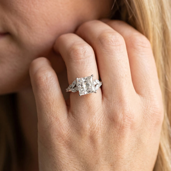 White gold Princess Solitaire Marquise Twist Band with Six-Prong Setting