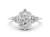 White gold Radiant Cut Brilliant Diamond with Cluster Setting on a Beaded Band and Four-Prong Setting_269