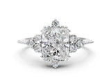 White gold Radiant Cut Brilliant Diamond with Cluster Setting on a Beaded Band and Four-Prong Setting_297