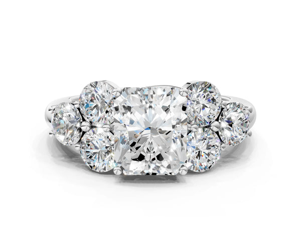 Platinum Radiant Cut Diamond Cluster Ring with Round Accent Stones and Prong Setting on a Classic Band