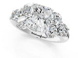White gold Radiant Cut Diamond Cluster Ring with Round Accent Stones and Prong Setting on a Classic Band_76