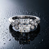 White gold Radiant Cut Diamond Engagement Ring with Bezel Set Round Side Stones and Prong Setting_15