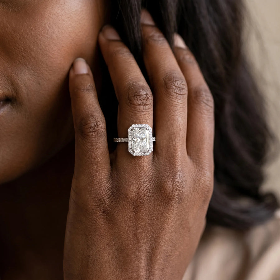 White gold Radiant Cut Diamond Halo Engagement Ring with Milgrain Detail and Pavé Band