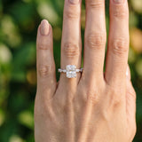 Platinum 7.03 Carat F VVS2 Radiant Diamond Ring with Marquise Side Stones and Prong Setting