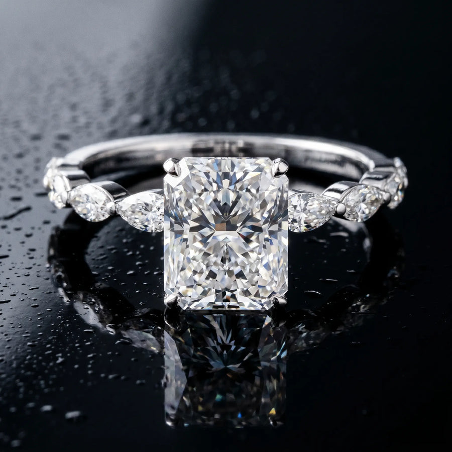 White gold Radiant Cut Diamond Ring with Marquise Side Stones and Prong Setting