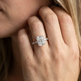 Platinum 7.03 Carat F VVS2 Radiant Diamond Ring with Marquise Side Stones and Prong Setting