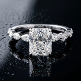 Platinum 7.03 Carat F VVS2 Radiant Diamond Ring with Marquise Side Stones and Prong Setting