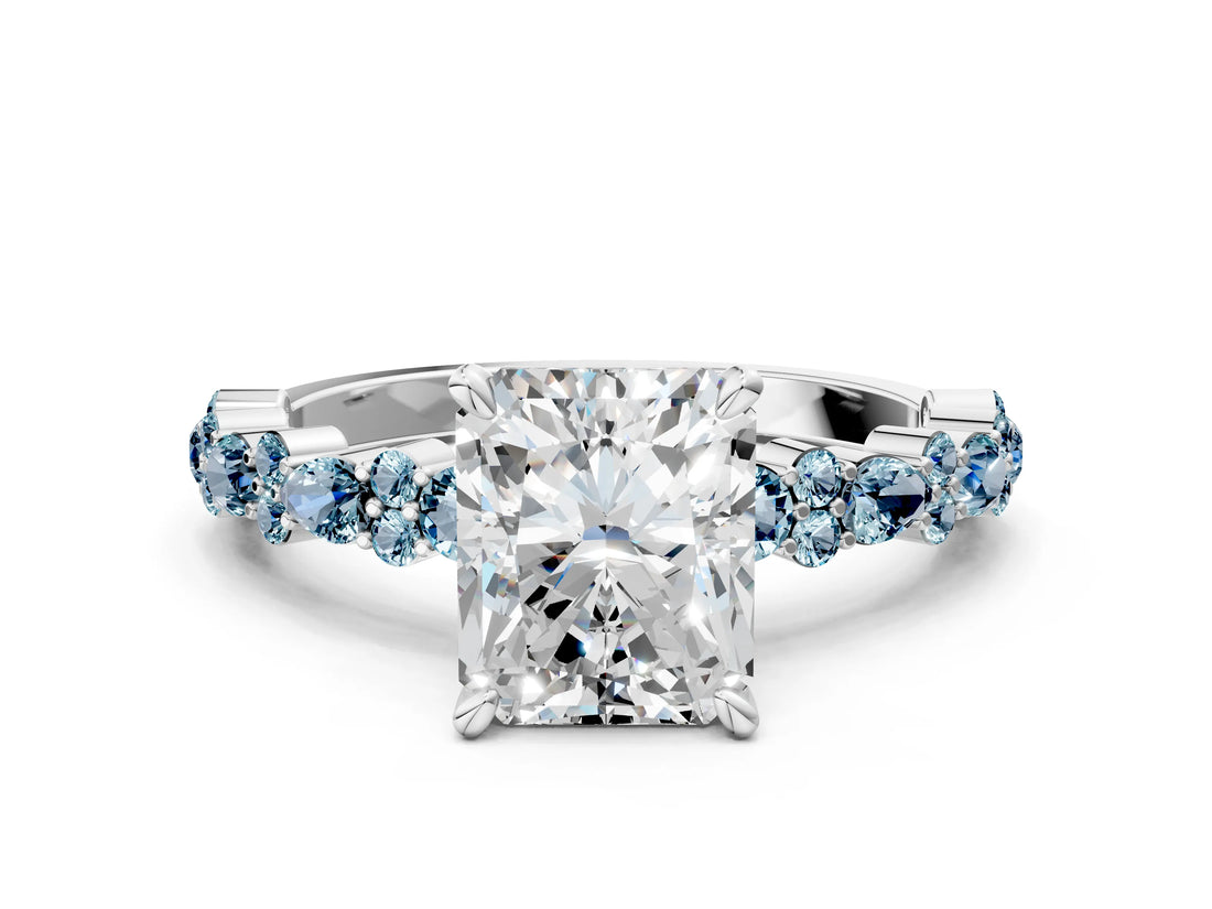 White gold Radiant Cut Diamond Side Stone Solitaire Ring with Round with Aquamarine side stone and Four-Prong Setting