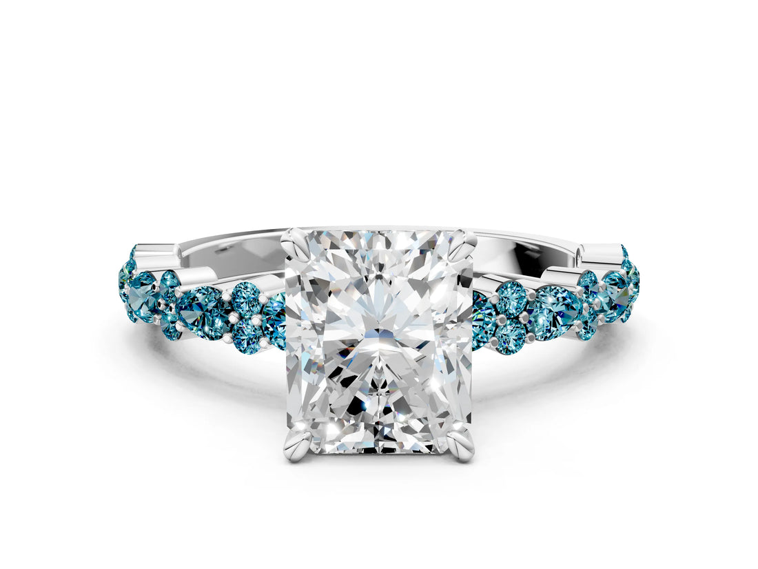 White gold Radiant Cut Diamond Side Stone Solitaire Ring with Round with Blue Topaz side stone and Four-Prong Setting