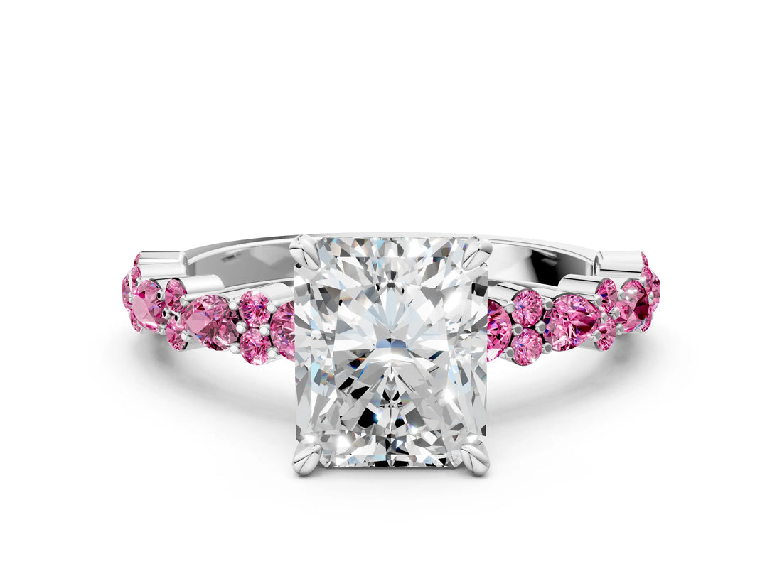 White gold Radiant Cut Diamond Side Stone Solitaire Ring with Round with Pink Sapphire side stone and Four-Prong Setting