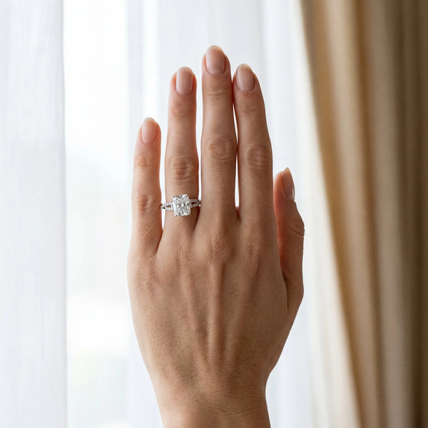 White gold Radiant Cut Diamond Solitaire Engagement Ring with Twisted Pavé Band and Four-Prong Setting