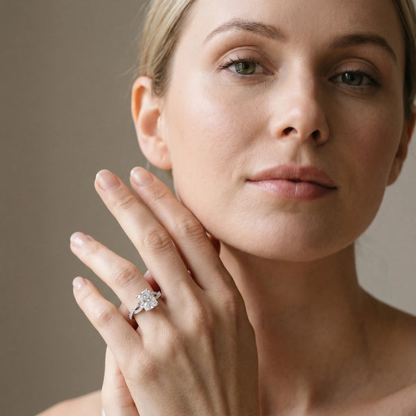 White gold Radiant Cut Diamond Solitaire Engagement Ring with Twisted Pavé Band and Four-Prong Setting
