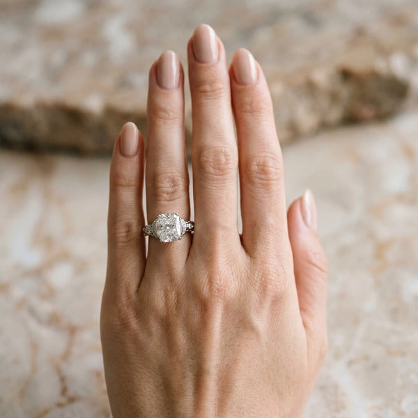 White gold Radiant Cut Diamond Solitaire Ring with Filigree Band and Four-Prong Setting