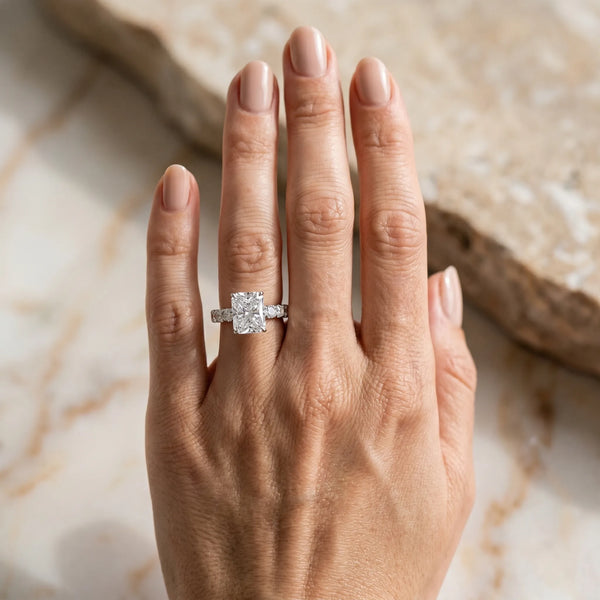 White gold Radiant Cut Diamond Solitaire Ring with Micro Pave Band and Prong Setting