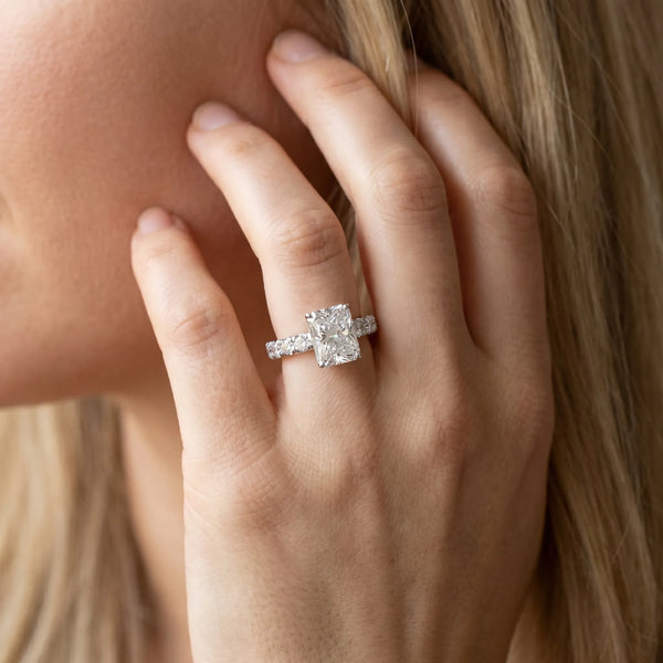 White gold Radiant Cut Diamond Solitaire Ring with Micro Pave Band and Prong Setting