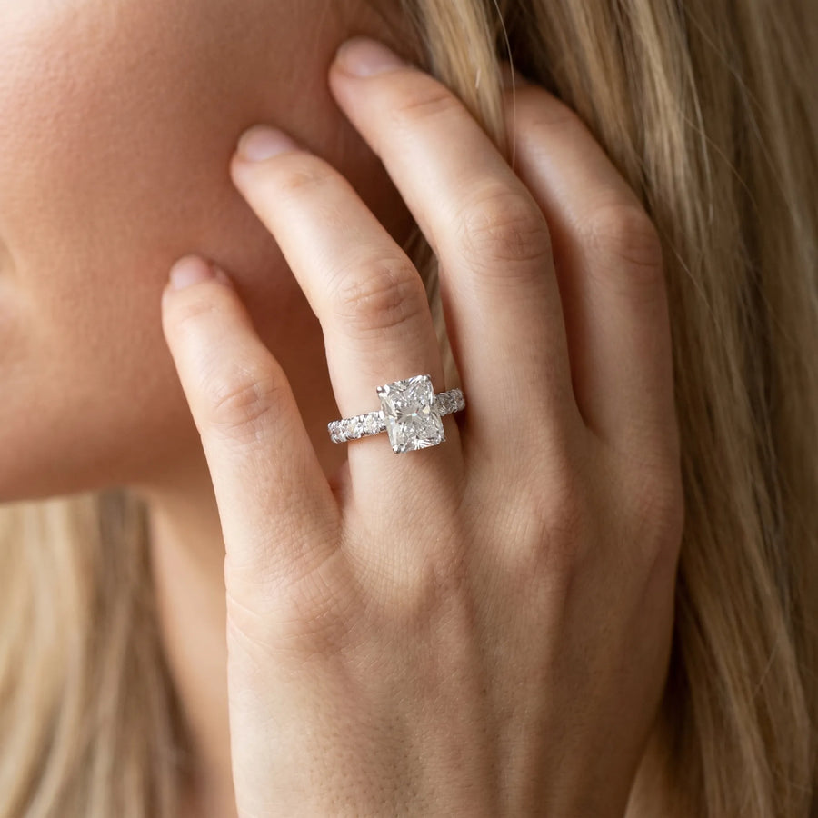 White gold Radiant Cut Diamond Solitaire Ring with Micro Pave Band and Prong Setting