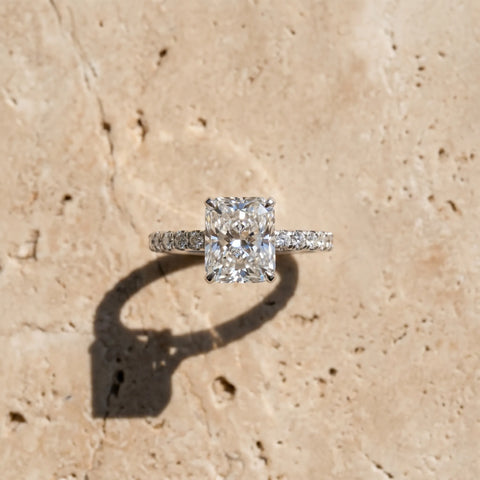 Platinum 1.04 Carat F VS1 Radiant Diamond Solitaire Ring with Round  Pavé Band and Four-Prong Setting