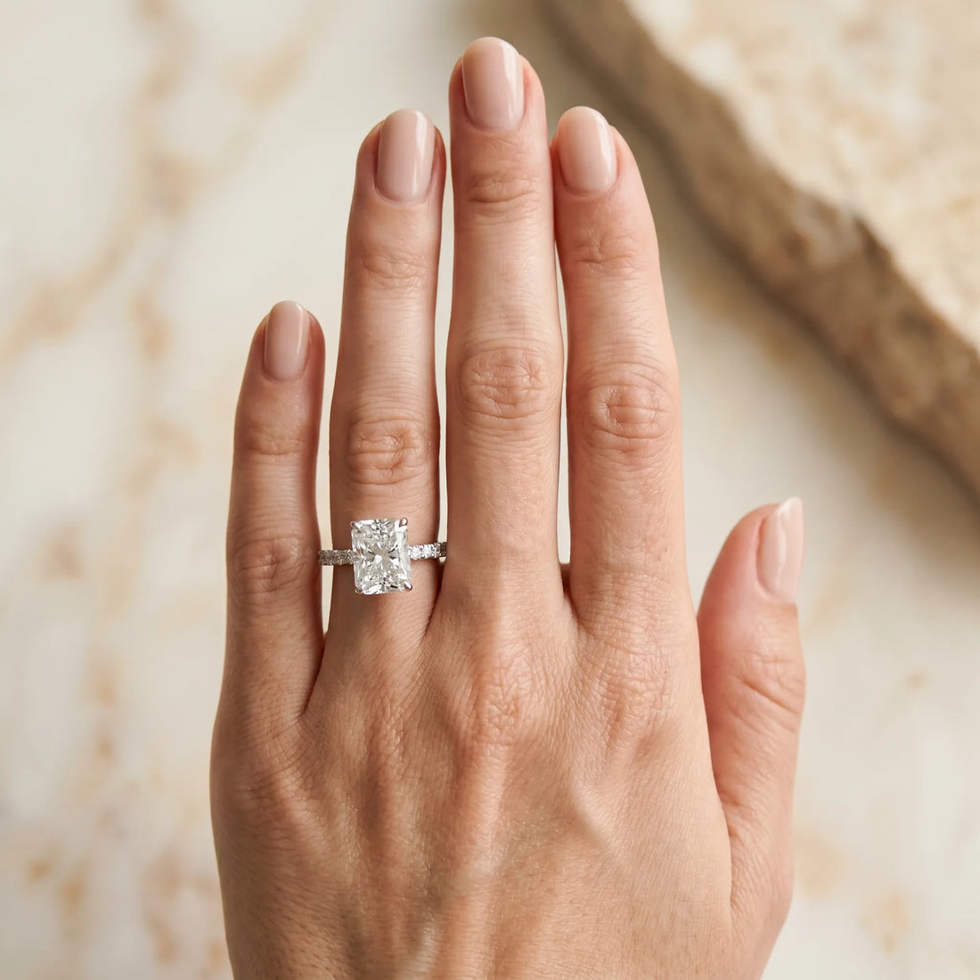 White gold Radiant Cut Diamond Solitaire Ring with Pavé Band and Four-Prong Setting_361