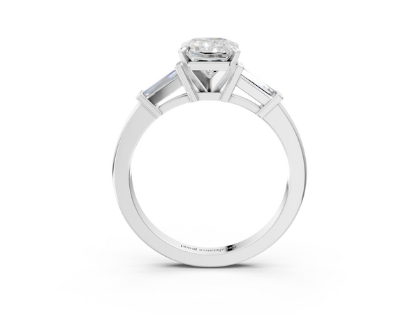 White gold Radiant Cut Diamond Solitaire Ring with Tapered Baguette Accents and Four-Prong Setting