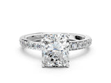 White gold Radiant Cut Diamond Solitaire with Pave Band and Four-Prong Setting