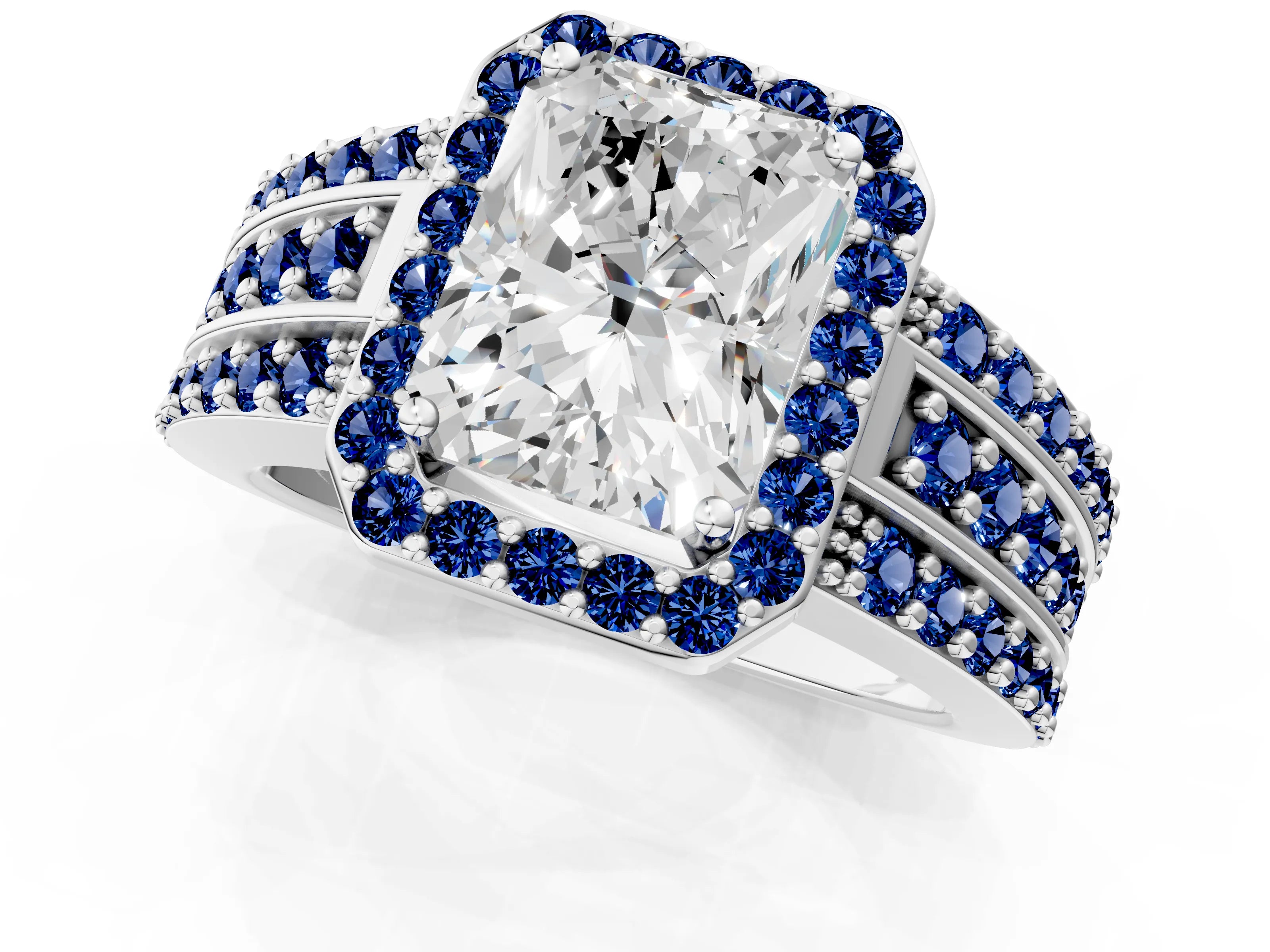 White gold Radiant Cut Halo Diamond Ring with Round with Blue Sapphire side stone Split Shank and Prong Setting_25
