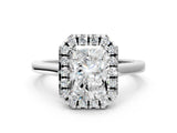 White gold Radiant Cut Halo Round Diamond Solitaire Ring with Pavé Band and Four-Prong Setting