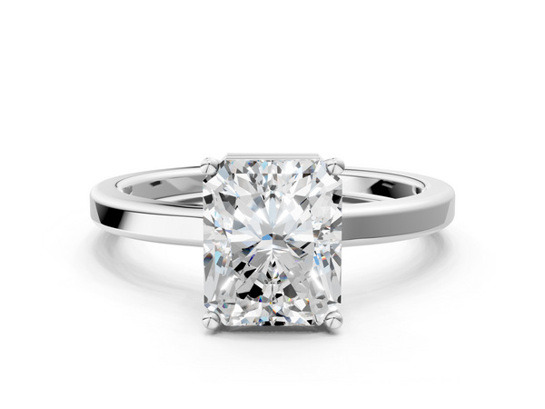 White gold Radiant Cut Solitaire Engagement Ring with Four-Prong Setting on a Classic Band