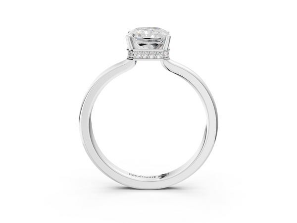 White gold Radiant Cut Solitaire Engagement Ring with Four-Prong Setting on a Classic Band