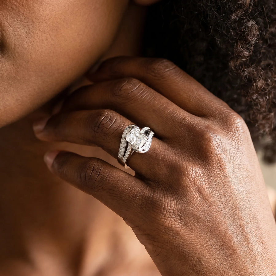 White gold Radiant Solitaire Bypass Diamond Engagement Ring with Channel-Set Band and Four-Prong Setting