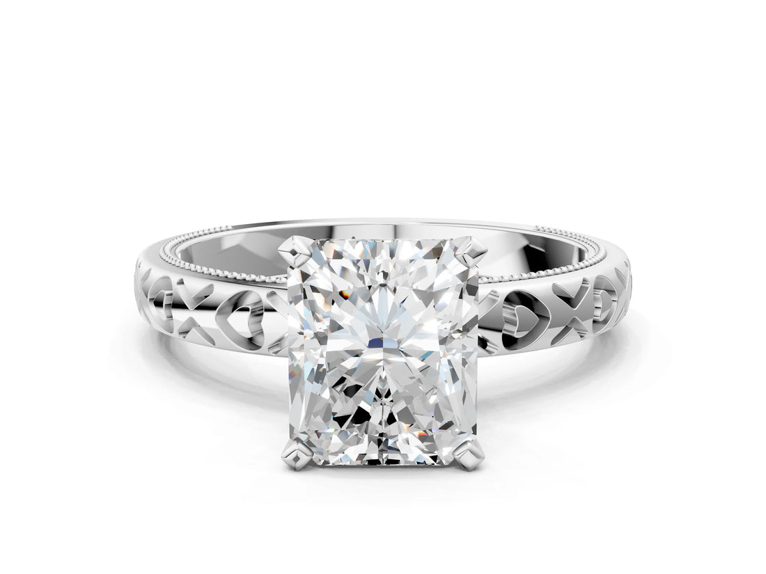 White gold Radiant Solitaire Diamond Engagement Ring with XO Engraved Band and Four-Prong Setting