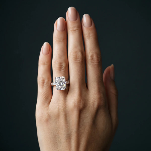 White gold Radiant Solitaire Diamond Ring with Channel-Set Baguette Band and Four-Prong Setting