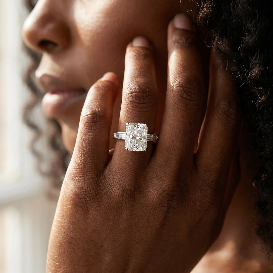 White gold Radiant Solitaire Diamond Ring with Channel-Set Baguette Band and Four-Prong Setting