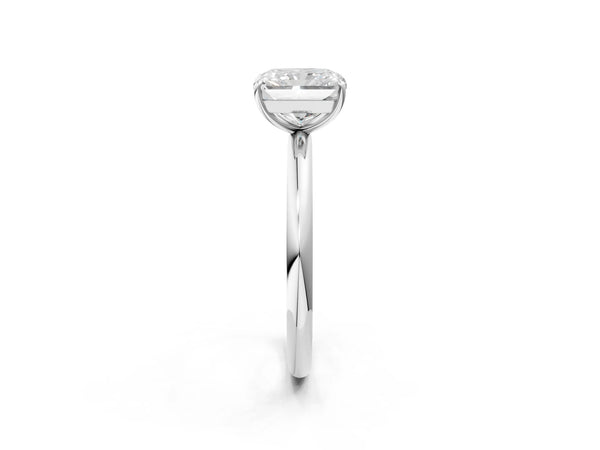 White gold Radiant Solitaire Diamond Ring with Four-Prong Setting on a Plain Band