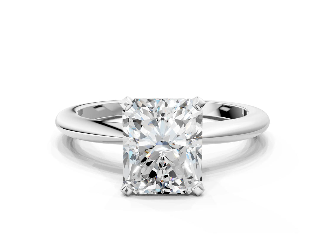 White gold Radiant Solitaire Diamond Ring with Six-Prong Setting on a Classic Band