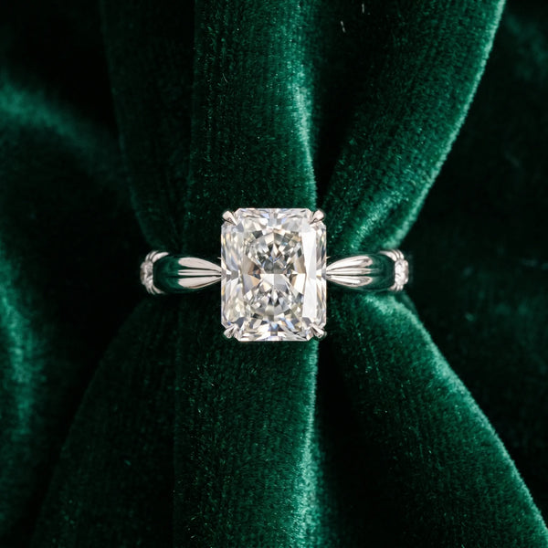 White gold Radiant Solitaire Diamond Twisted Band with Four-Prong Setting