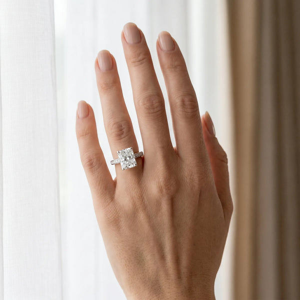White gold Radiant Solitaire Prong Set Diamond Engagement Ring with Pave Band