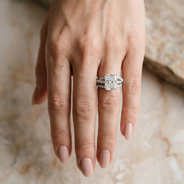 White gold Radiant Solitaire Twist Band with Pavé Setting and Four-Prong Setting