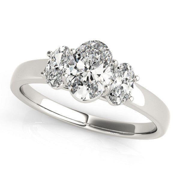 White gold Radiant Three-Stone Diamond Ring with Prong Setting on a Classic Band 1