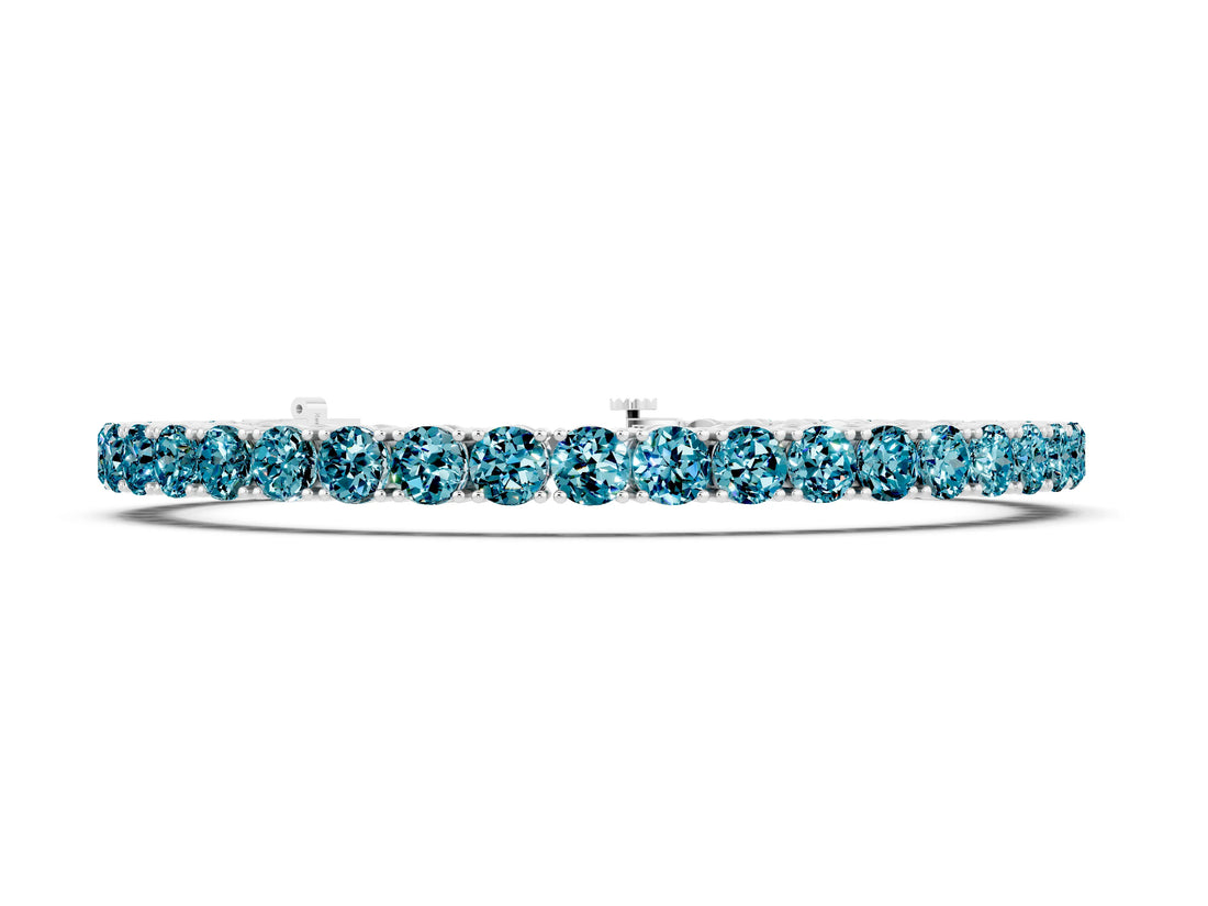Silver 1.09 Carat Round Brilliant Blue Topaz Tennis Bracelet with Prong Setting