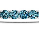 Silver 1.09 Carat Round Brilliant Blue Topaz Tennis Bracelet with Prong Setting