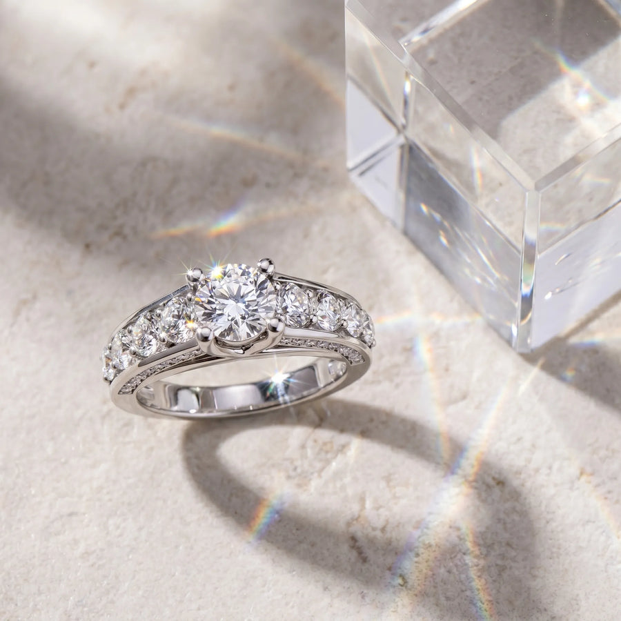 White gold Round Brilliant Channel-Set Diamond Engagement Ring with Split Shank and Four-Prong Setting