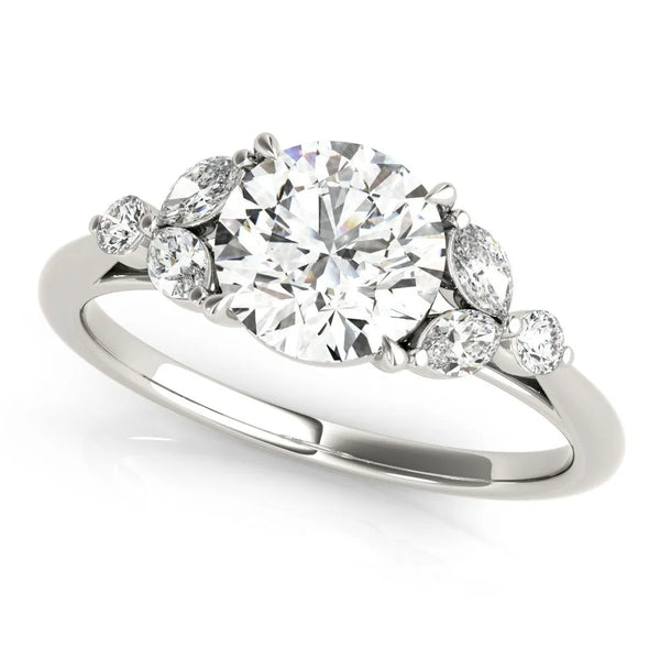 White gold Round Brilliant Cluster Diamond Ring with Marquise and Round Cut Stones on a Classic Band with Four-Prong Setting
