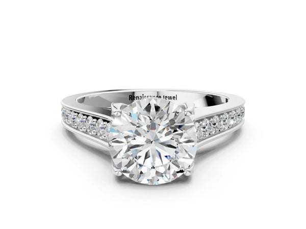 White gold Round Brilliant Cut Diamond Engagement Ring with Pavé Band and Four-Prong Setting