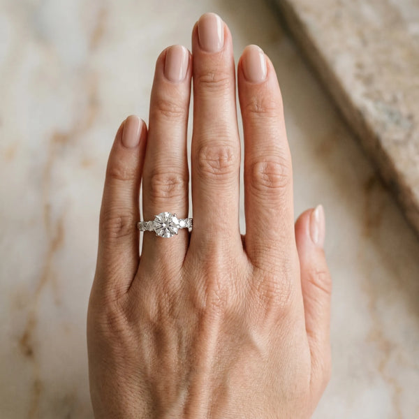 White gold Round Brilliant Cut Diamond Five-Stone Prong Set Engagement Ring with Channel Band