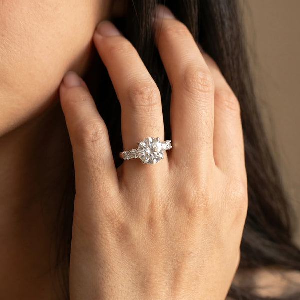 White gold Round Brilliant Cut Diamond Five-Stone Prong Set Engagement Ring with Channel Band
